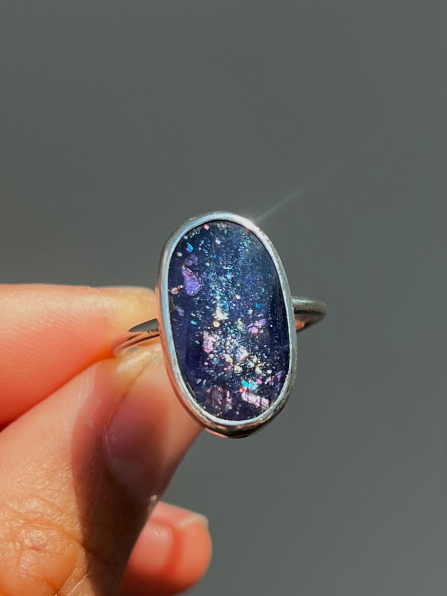 Glitterbomb iolite sunstone ring