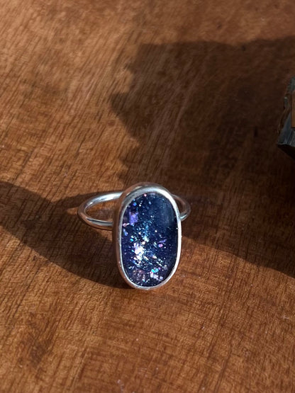 Glitterbomb iolite sunstone ring