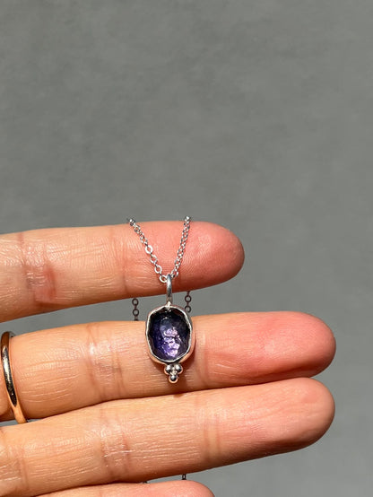 Purple shimmer iolite pendant