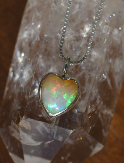 See with our hearts necklace