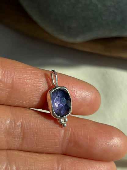 Purple shimmer iolite pendant